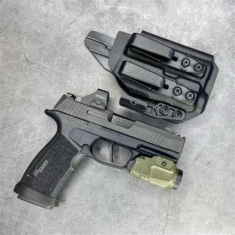 The <b>P365</b> originally held 10 rounds, but <b>Sig</b> released a 12-, then a 15-round magazine in short order. . Will a sig 365x fit in a p365 holster
